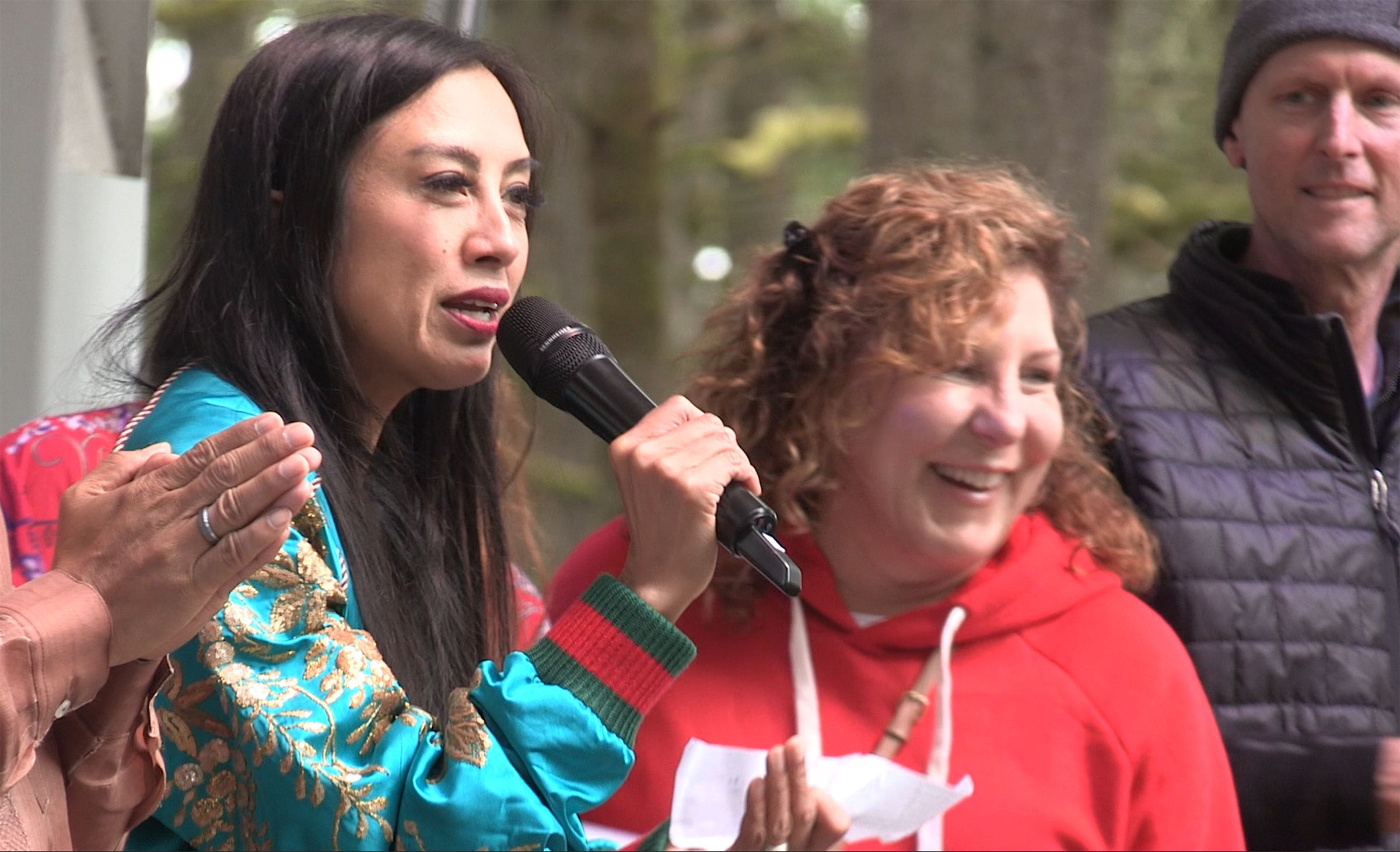 Festival guests moving through community partner activations.